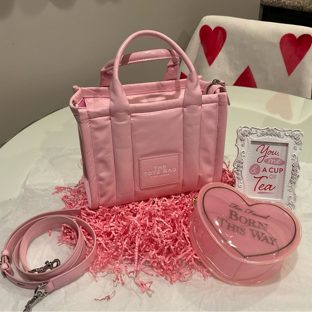 The shiny mini tote in bubble gum pink use one time too small for me.